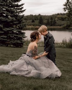 _DSC7071 bride touching foreheads with her son in wedding photo